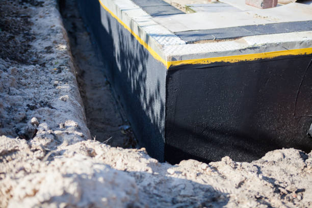 Professional Waterproofing technician working in Ovid, MI